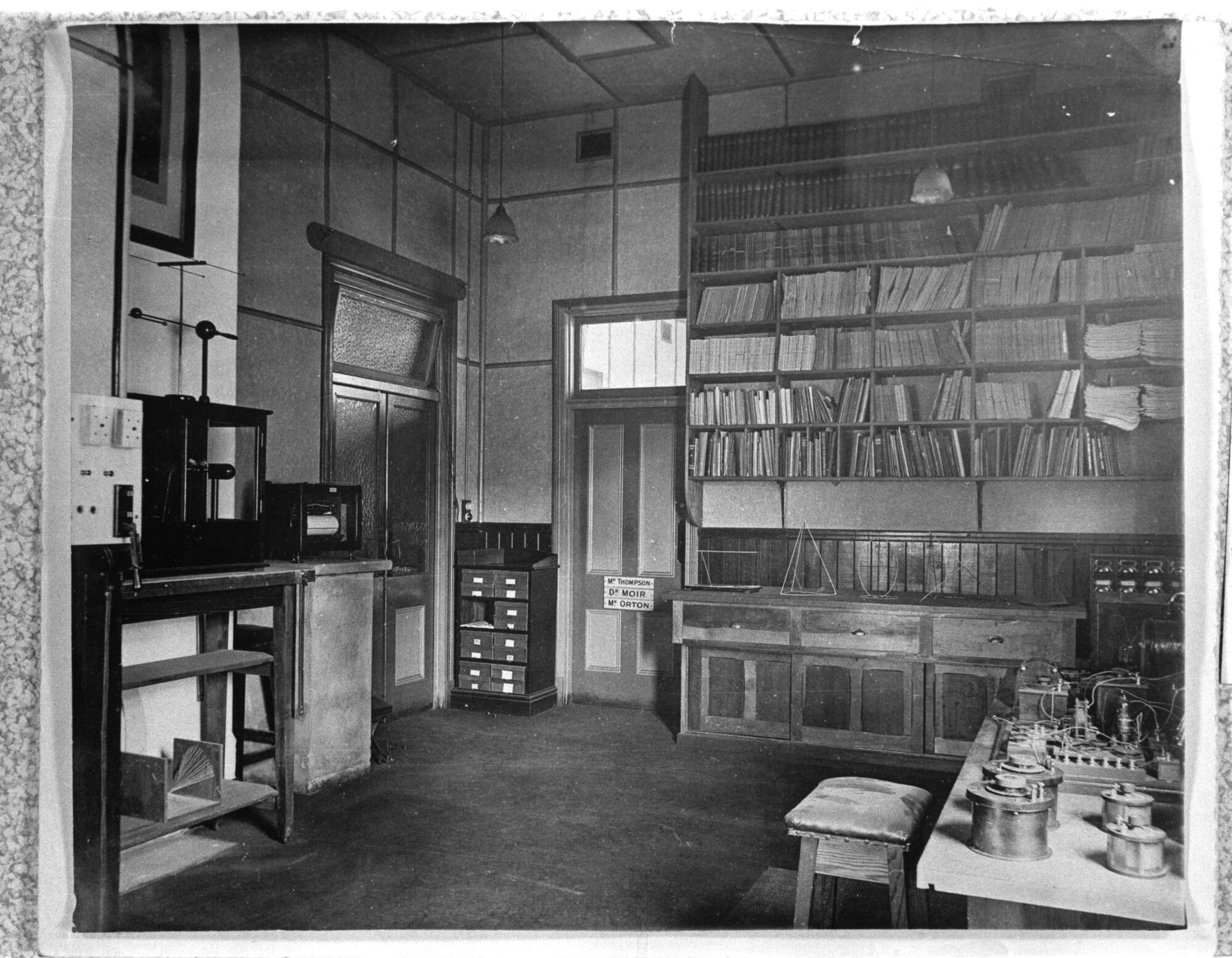 1901P - Interior of Irwin Street Buildings - Physics Department staff room and research room - circa 1920 - includes scientific models and instruments