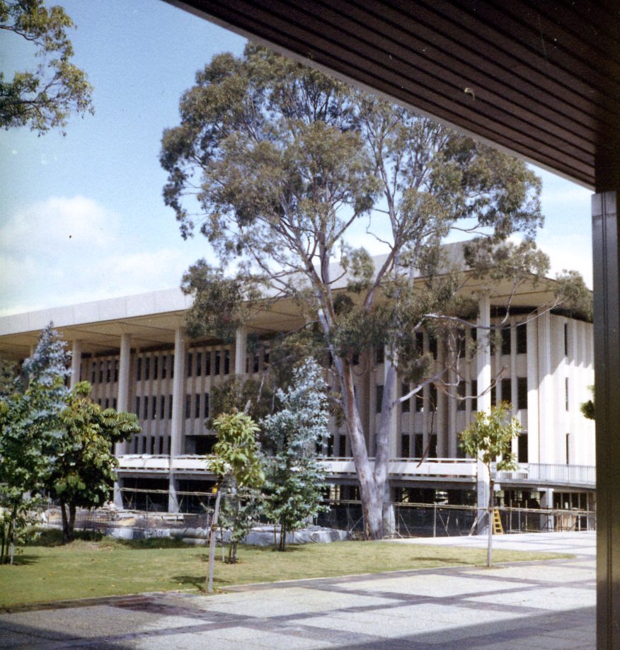 2565P - Reid Library - 24 October 1963 - View from front of Physics building across path &amp; lawn showing scaffolding around base