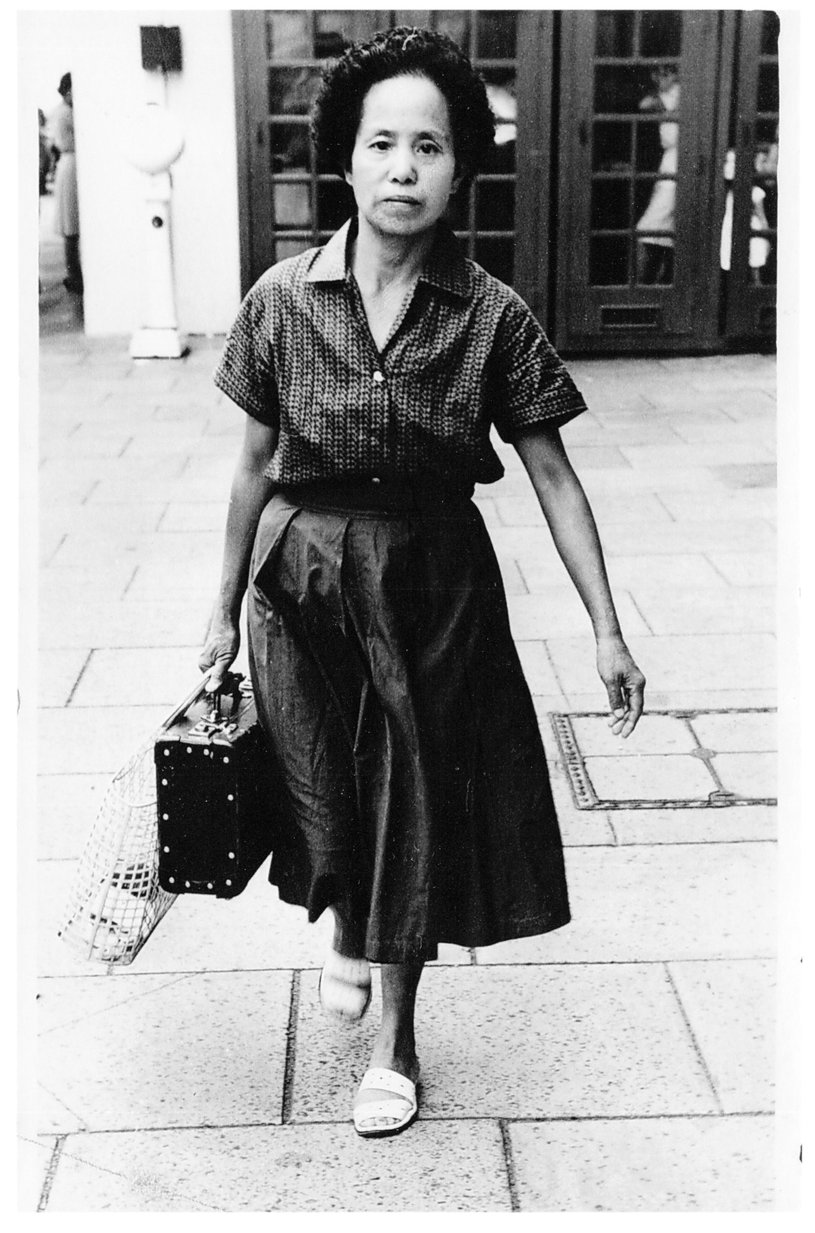 Ah Tai Hoy c1960 with banking suitcase