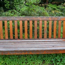 62787P - UWA Benches Project - FEAKES : Margaret J Feakes (Bennetts) BSc 1946 Dip Ed 1953  Science Student, Lecturer, Researcher, Teacher, 1925 - 2013 - Tropical Grove, Great Court South - Close Up