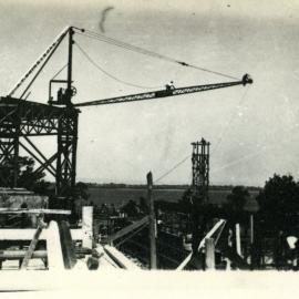 68P - Construction - Winthrop Hall - rigging the crane - river in background - circa September 1931