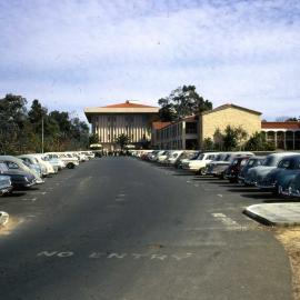 3714P - Vehicles including buses in car park in front of Arts Building and Reid Library - 19 August 1966