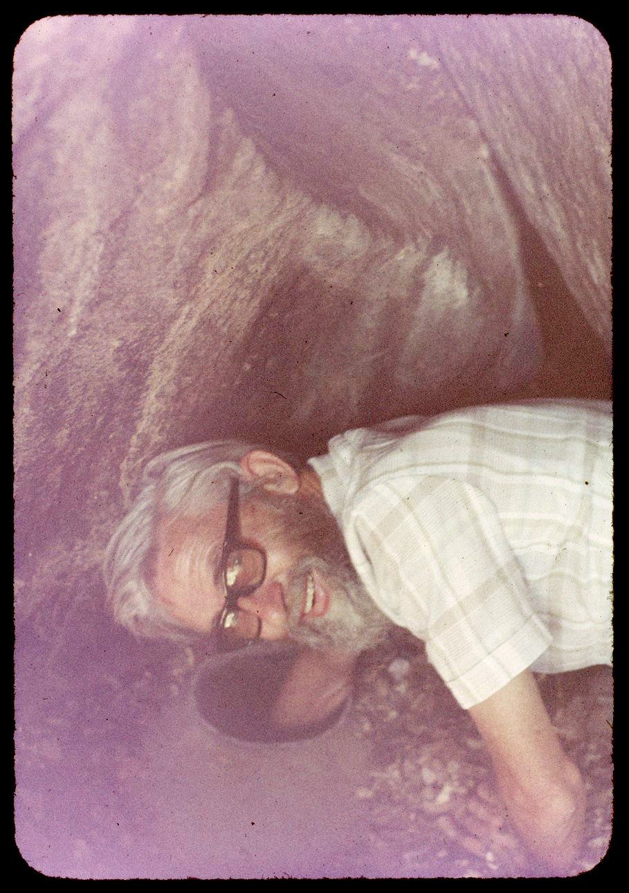 Mr McGee with hand in buried pot at 2028 A1 G001.