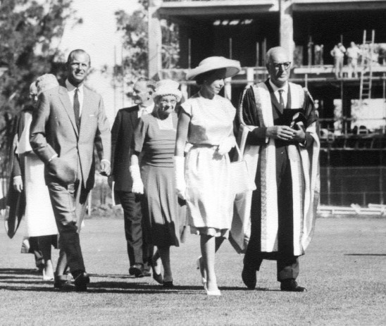 Cropped from 2223P - Queen Elizabeth II and Prince Philip with Sir Alexander Reid in front of the Reid Library (under construction) during the royal visit - 1963