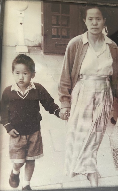 Kevin with his mother in a photograph from a street photographer outside the GPO, Perth, c.1960. Provided courtesy of the Hoy family.